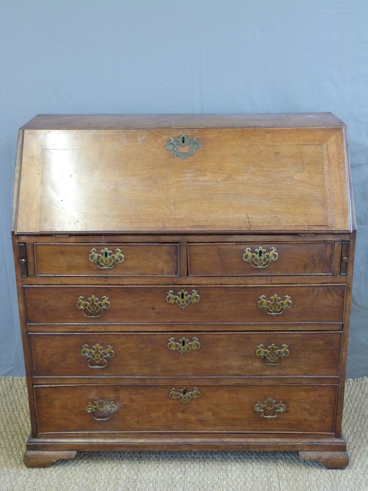 A 19thC mahogany bureau with two over three graduated drawers and fitted interior raised on bracket - Image 2 of 6