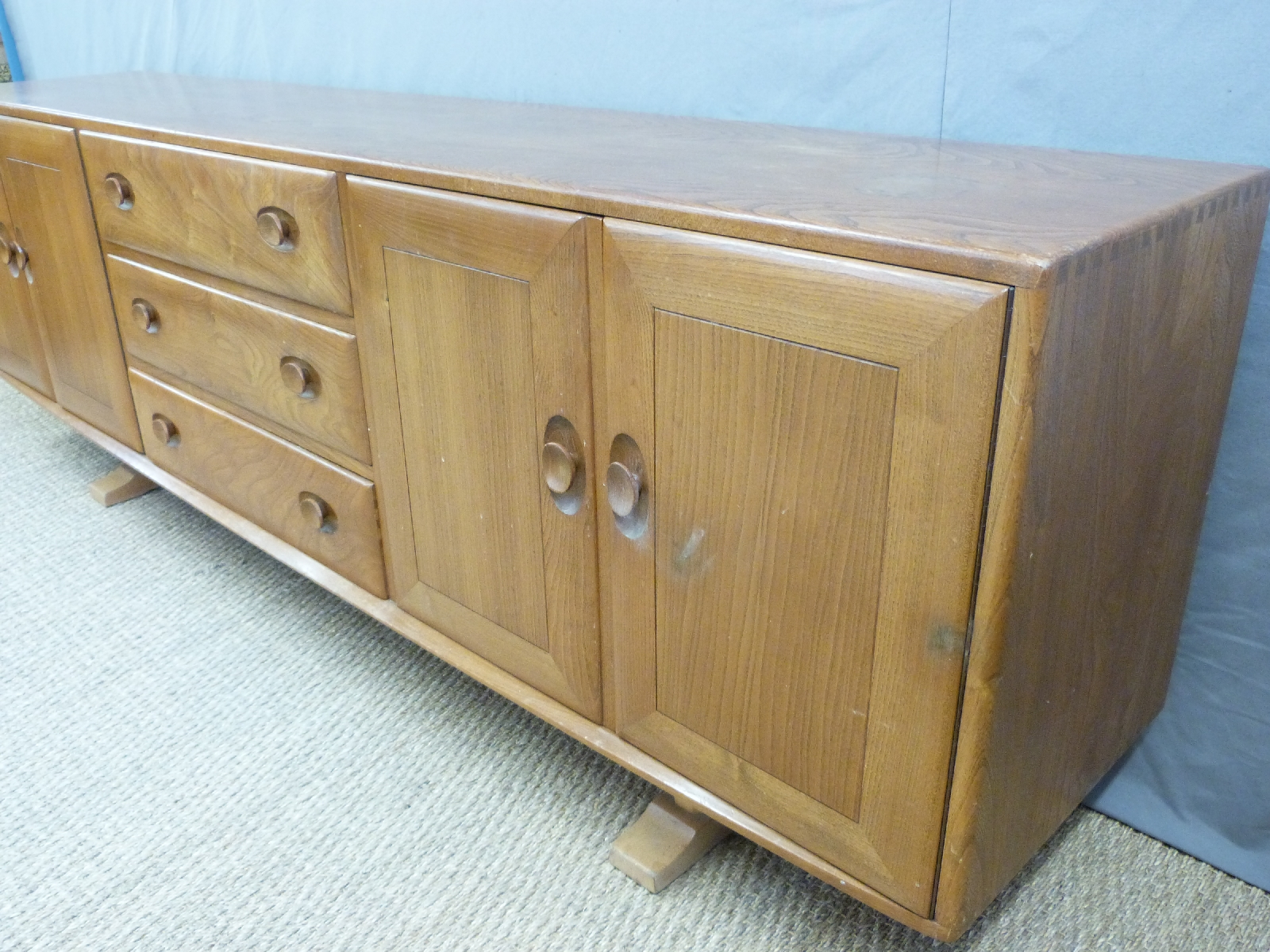 A retro Ercol light elm long sideboard with an arrangement of two double cupboards each end and - Image 2 of 2