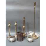 Three brass candlesticks, a tall brass electric table light,