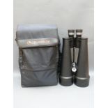 A pair of Celestron SkyMaster 25x100 high powered waterproof binoculars in original carry bag