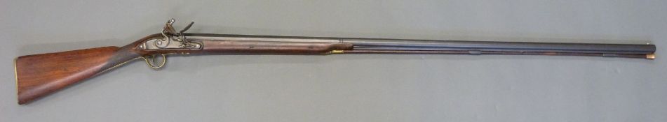 Halliday & Biddle 12 bore flintlock hammer action gun with named and line engraved lock,