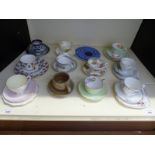 A collection of decorative and collectable trios / cups and saucers including Foley, Winchcombe,