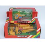 Two Britains model farm vehicles New Holland Combine Harvester 9575 and Helicopter Crop Spray 9511,