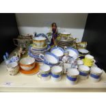 A collection of decorative ceramics including fine bone china trios, tea ware, Coalport, figure,