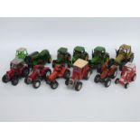 Twelve Britains and similar 1:32 scale diecast and plastic model John Deere, Massey Ferguson,