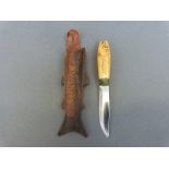 A carved figural fish knife marked OYO Geilo Rustfri to blade and Norefield to handle,