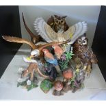 A quantity of bird figures including Beswick bald and golden eagles, whisky decanters, Goebel owl,