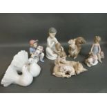 Six boxed Lladro figures comprising Kissing Doves, Playful Piglets, Continental Companion,