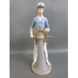 A Lladro figure of a sailor or helmsman