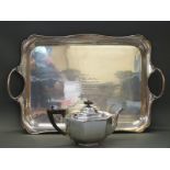 A large silver plated tray, length 58cm, and octagonal plated tea pot,