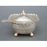A Victorian hallmarked silver mustard with blue glass liner, Sheffield 1889, maker Atkin brothers,