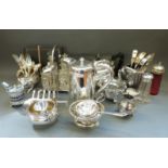 A quantity of silver plated ware to include four-bottle cruet, teaset, silver-topped sugar caster,