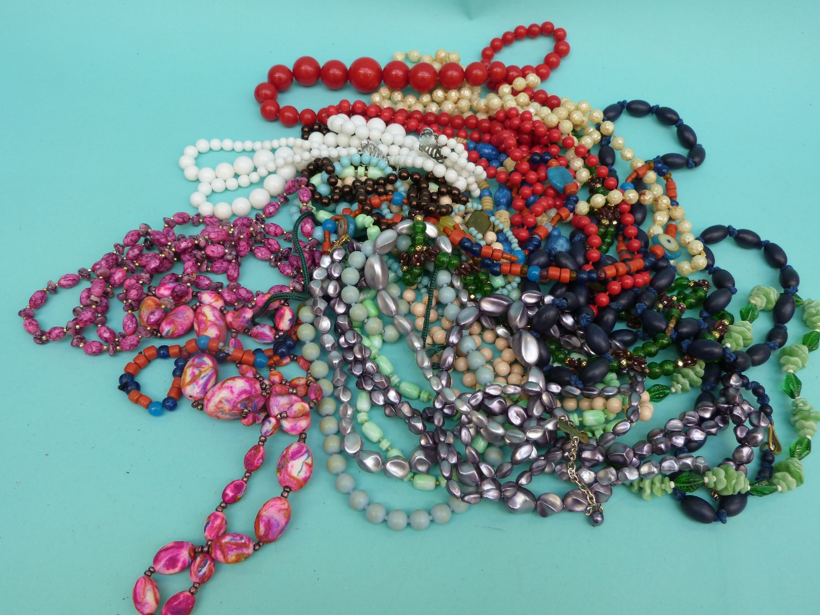 A collection of beaded necklaces to include glass beads, - Image 6 of 7