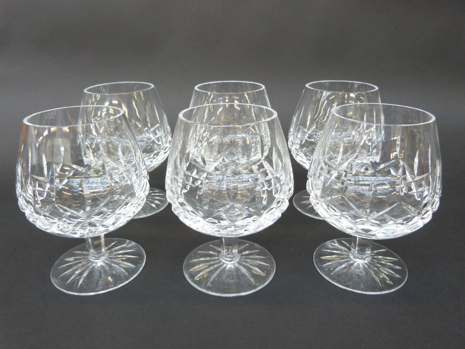 A set of six Waterford Crystal cut glass brandy glasses,