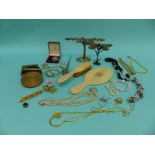 A collection of jewellery including silver bangles, French jet and pearl necklace, three compacts,