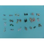 A collection of 21 pairs of silver earrings to include emerald, pearl,