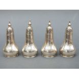 A set of four Edward VII hallmarked silver peppers, Sheffield 1904, maker Atkin Brothers,