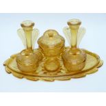 Pressed amber glass seven piece dressing table set in tray