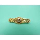 A 9ct gold brooch set with diamonds (Chester 1900)