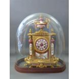 A mid to late 19thC French clock in gilt metal with painted Sevres style panels,