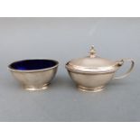 A George V hallmarked silver mustard and open salt with blue glass liner, Sheffield 1932,