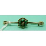 A Victorian forget-me-not brooch set with turquoise and a seed pearl,