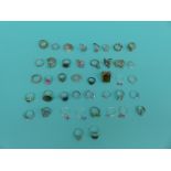 A collection of 42 silver/white metal rings including labradorite,