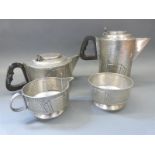 An Art Deco pewter Roundhead style tea set