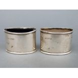 A pair of George V hallmarked silver open salts, one with blue glass liner, Sheffield 1917 and 1918,