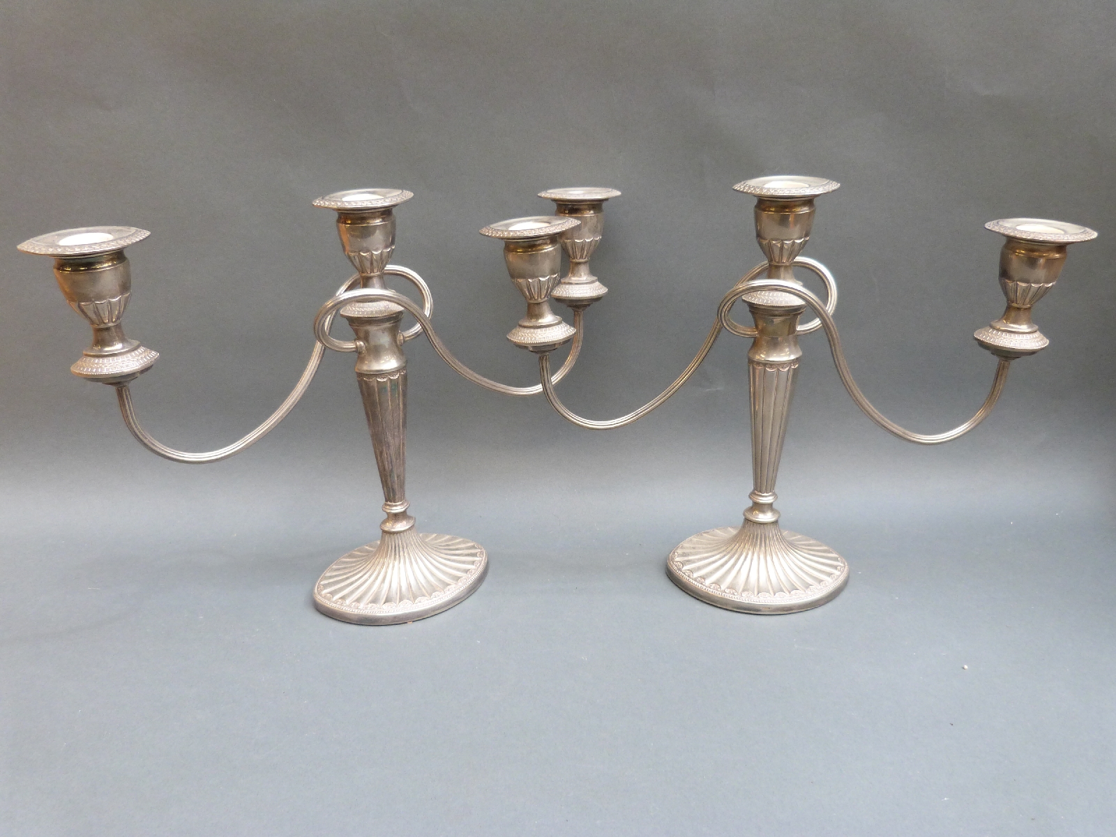 A collection of plated ware including candleabras, one with four branches; tray, fish servers, - Image 3 of 4