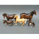 A collection of Beswick and Royal Doulton figures including palomino prancing Arab with box,