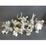 A collection of Nao animal figures including cats,