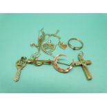 Two 9ct gold crescent brooches, two 9ct gold pendants, a cross pendant with a stanhope,