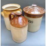 Three stone jars one for eggs,