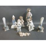 A collection of boxed Lladro dog,