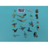 A collection of brooches depicting birds to includes enamel, bone, ceramic, metal, wood,
