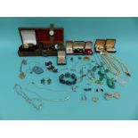 A collection of costume jewellery to include Butler and Wilson earrings,