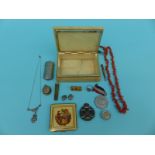 A collection of jewellery to include a coral necklace, gilt and coral brooch, Victorian locket,