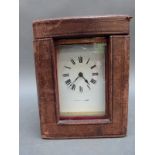 A Mappin & Webb cased brass carriage clock with reeded columns,