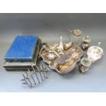 A collection of plated ware including a trefoil Walker & Hall basket, toast rack, cutlery,