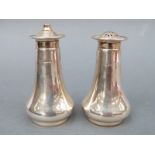A George VI hallmarked silver salt and pepper, Sheffield 1947, maker Atkin Brothers, height 8.