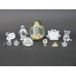 Ten Swarovski cut glass animals and objects including a large penguin, bears,