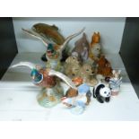 A collection of ceramics to include Beswick pheasant and duck figures, panda,
