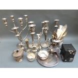 A collection of plated ware including candleabras, one with four branches; tray, fish servers,