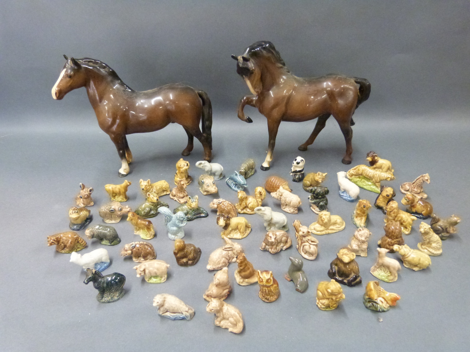 Two Beswick horses stocky jogging mare and Welsh cob,