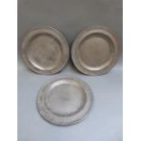 A set of three 18thC pewter side plates with London touch marks and maker's mark possibly for Home,