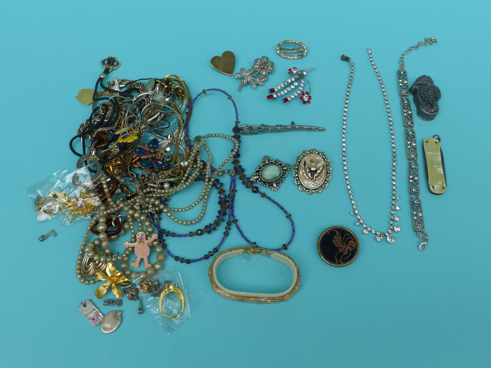 A collection of costume jewellery to include necklaces,