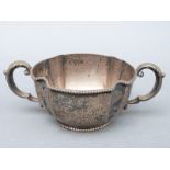 A Gorham American white metal sugar bowl of lobed design,