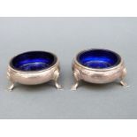 A pair of George II three-footed hallmarked silver open salts, London 1745,