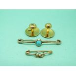 Two yellow metal brooches and two 18ct gold studs,